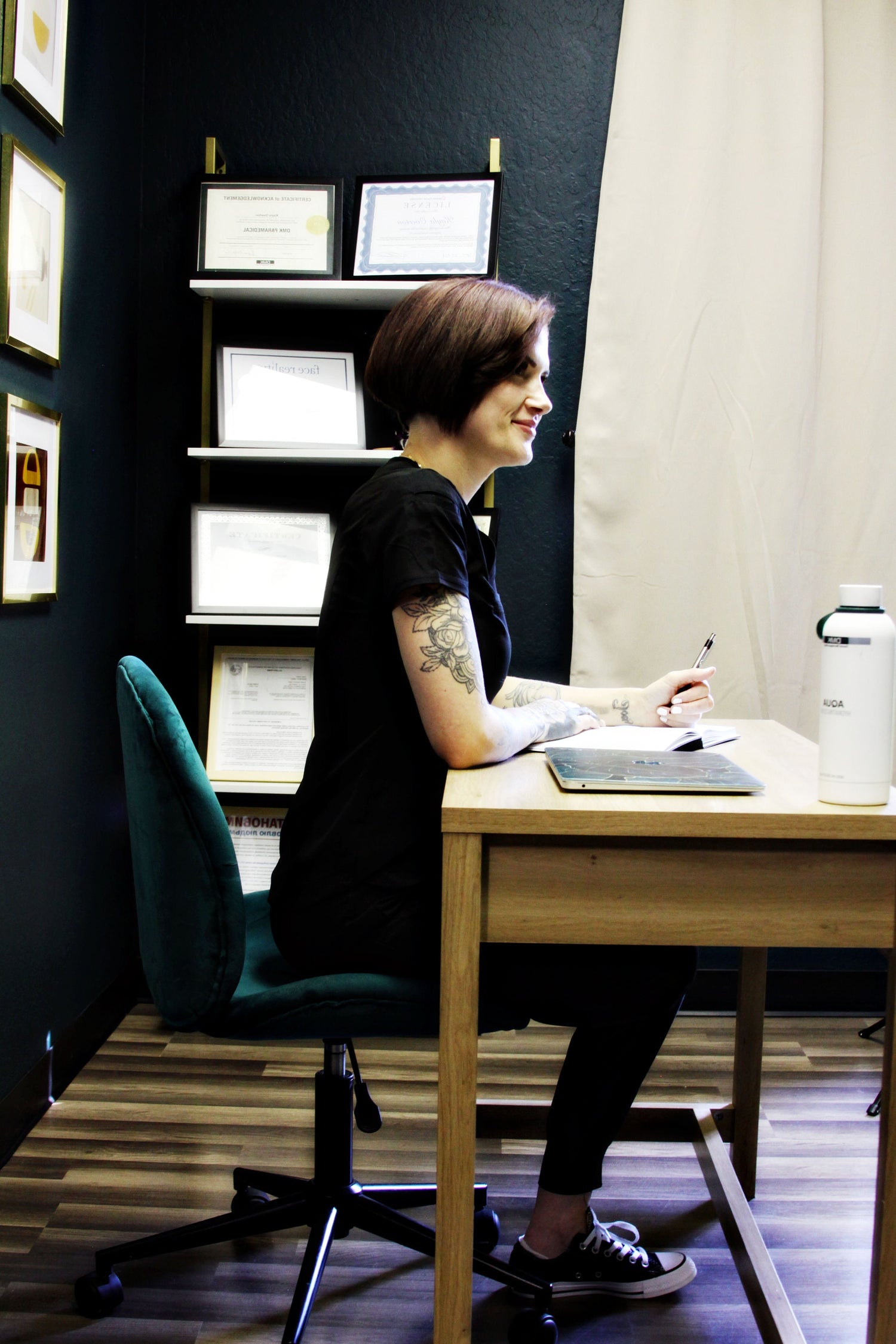 Esthetician at desk